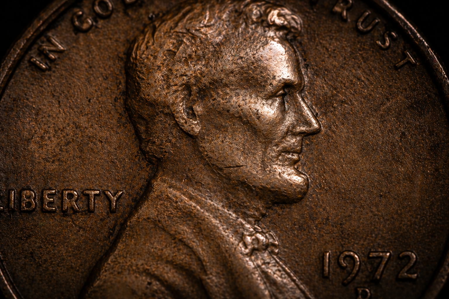 Close up of penny showing worn and detailed areas